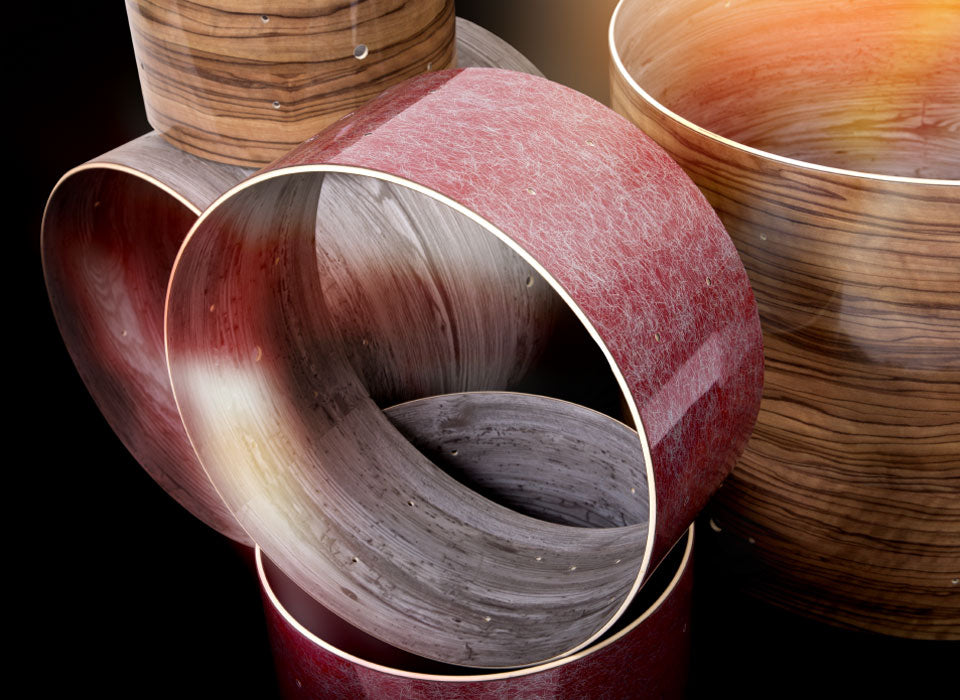 Tamburo drum shells in natural wood and finished veneers