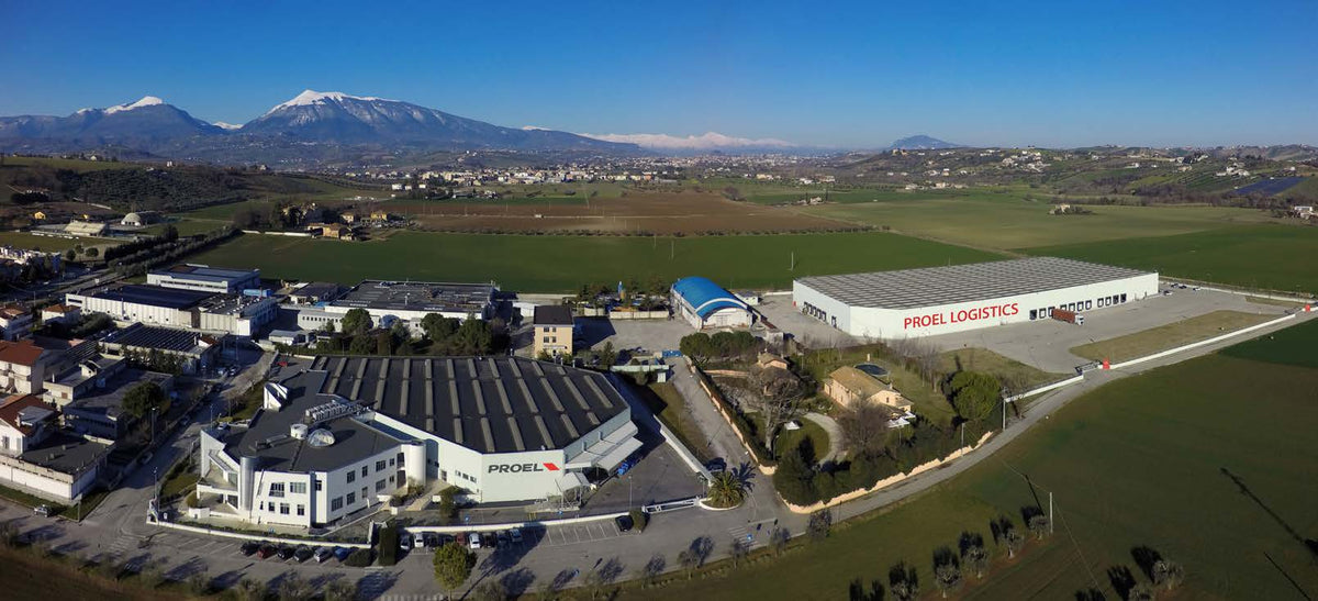 Aerial view of the Proel headquarters in Sant'Omero, with the Gran Sasso range behind